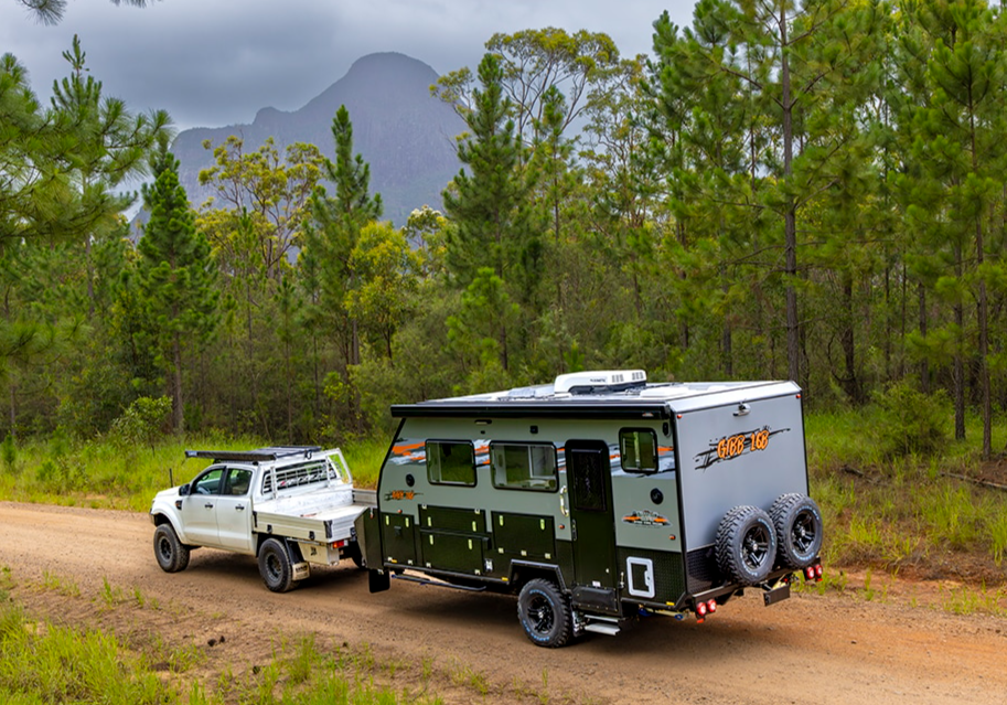 Austrack Gibb 16B being towed on a dirt road